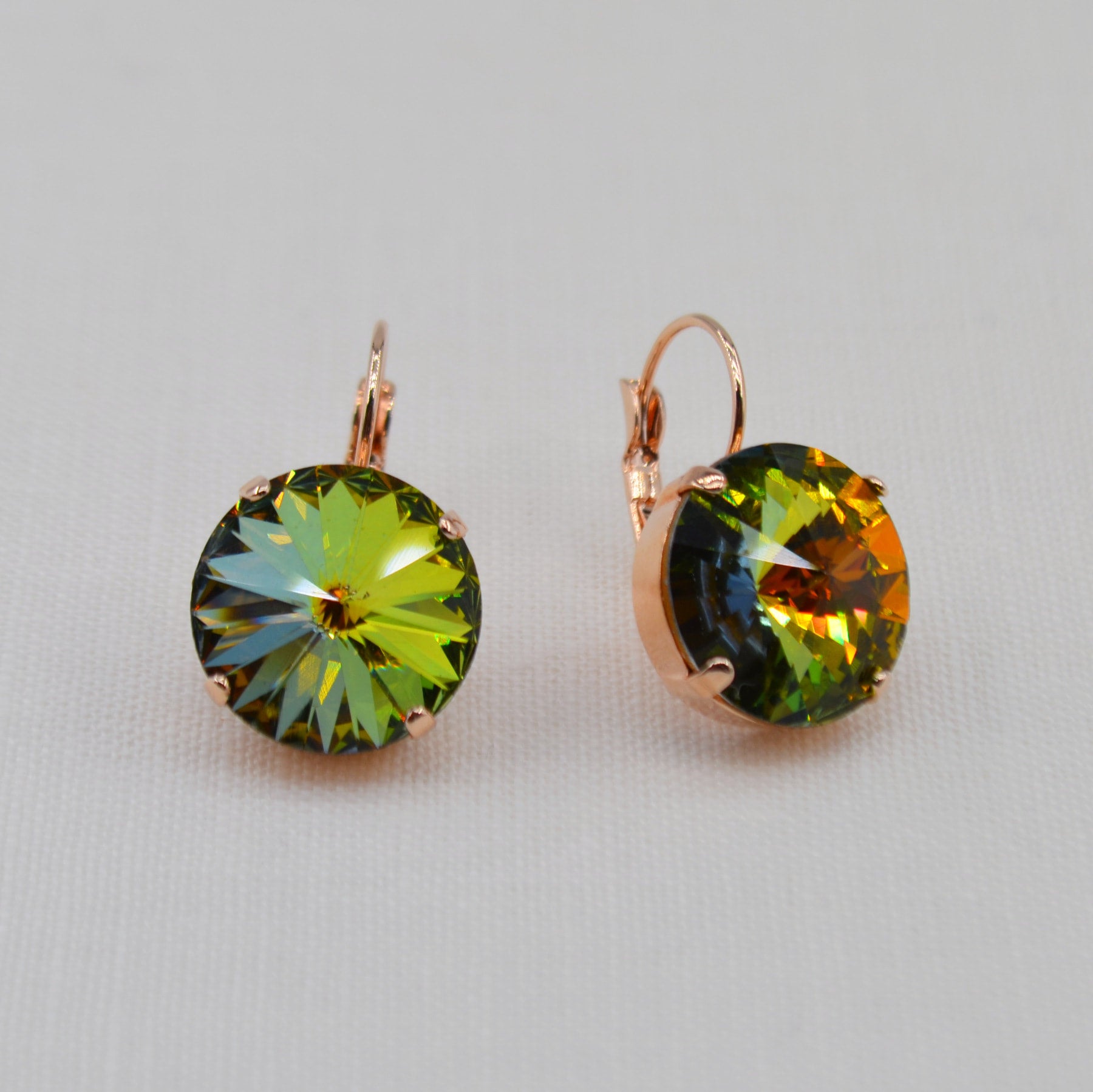 Green swarovski 2025 crystal earrings